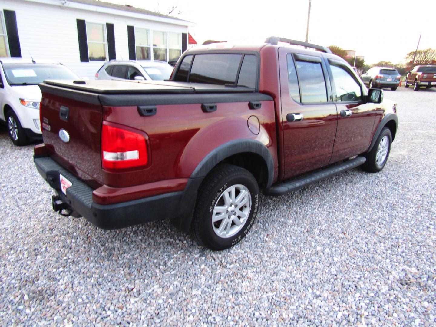 2010 Bronze /Tan Ford Explorer Sport Trac XLT 4.0L 2WD (1FMEU3BE3AU) with an 4.0L V6 SOHC 12V engine, Automatic transmission, located at 15016 S Hwy 231, Midland City, AL, 36350, (334) 983-3001, 31.306210, -85.495277 - Photo#7